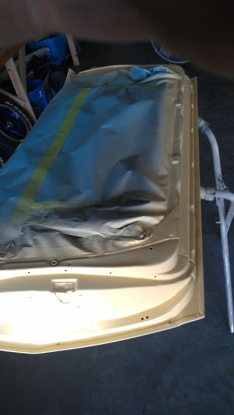 1973 Chevrolet Camaro - Car door is being prepped and masked for a paint job.