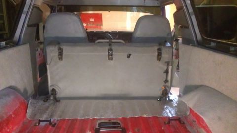 1978 Ford Bronco - The interior of a vehicle shows rear seats and the cargo area, with a "Supermotors.net" watermark visible.