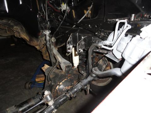 1989 Jeep Cherokee - stock driverside mount from v8 ZJ, welded tabs so could lower engine approx an inch. bolts up perfectly and everything clears.