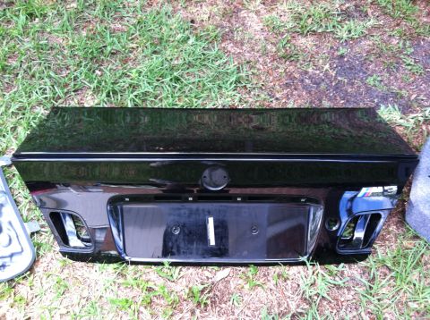 2005 BMW M3 - Rear view of a black BMW M3 trunk lid, showing the M3 badge and license plate area.