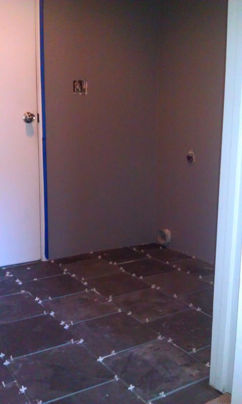 1989 Ford Bronco - Room renovation in progress, showing newly laid tile flooring and unfinished walls.