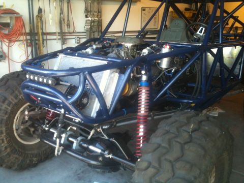 1966 Ford Bronco - Custom buggy with a tube frame chassis, large off-road tires, and exposed engine components.