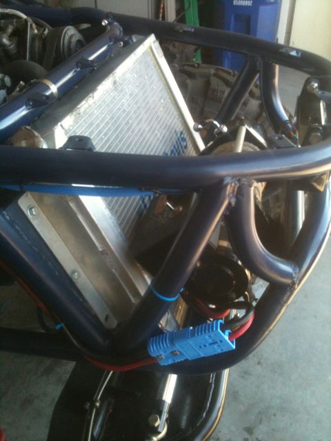 1966 Ford Bronco - Close-up of a custom buggy's chassis, showing the radiator and electrical connections.