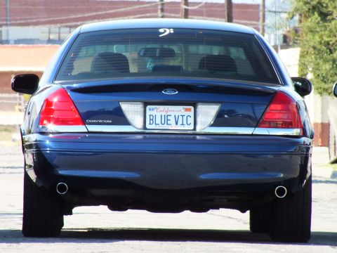 2003 Ford Crown Victoria - Crown Victoria tail with dual chrome exhaust tips, lowered stance and BLUE VIC plate on California tag