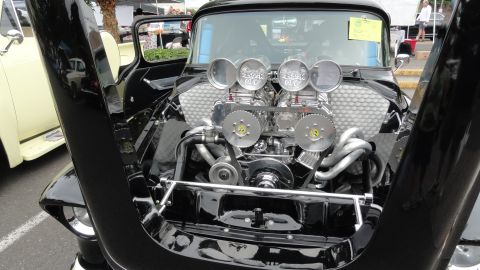 1964 Ford Fairlane - Custom engine with dual carburetors and exposed components, hood up.
