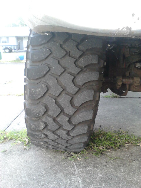 1996 Ford Bronco - Before the adjustment. As you can see the tire has very bad camber. I am using the 3.2* adjsutable bushings. Other sized bushings will work…