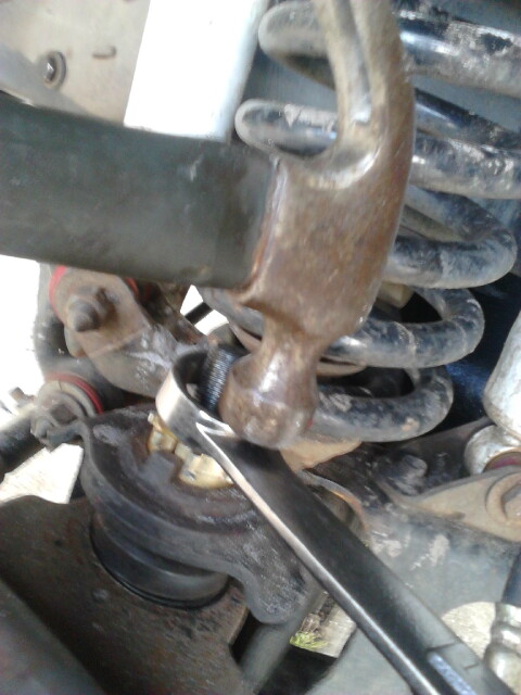 1996 Ford Bronco - Hit the bushing into place and try to get it as deep as you can. avoid damaging the balljoint. Since i didnt have a socket big enough i had…