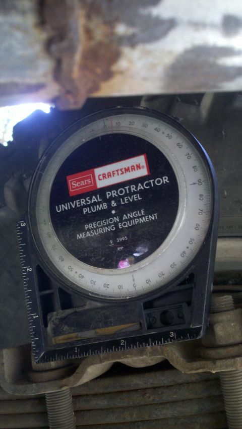 1978 Ford Bronco - A Sears Craftsman universal protractor and level is used for precision angle measurements.