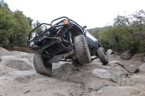 1985 Toyota 4Runner - Modified 1985 Toyota 4Runner navigating a difficult rocky terrain.