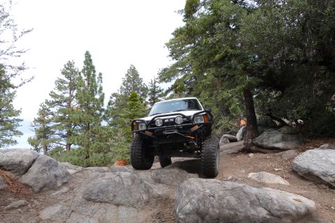 1985 Toyota 4Runner - This modified Toyota 4Runner navigates a challenging rocky terrain, its off-road capabilities.