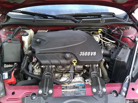 2008 Chevrolet Impala - The engine bay of a 2008 Chevrolet Impala shows the 3500 V6 engine and associated components.