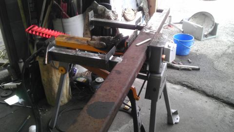 1989 Ford Bronco - Workshop scene with metal fabrication equipment and various tools.