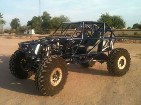 1966 Ford Bronco - This custom-built buggy features a roll cage and heavy-duty suspension for off-road use.