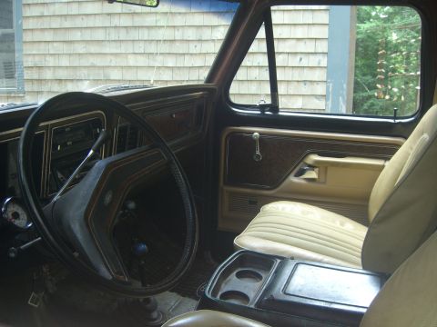 1979 Ford Bronco - Interior view of a 1979 Ford Bronco, highlighting the dashboard and seating.