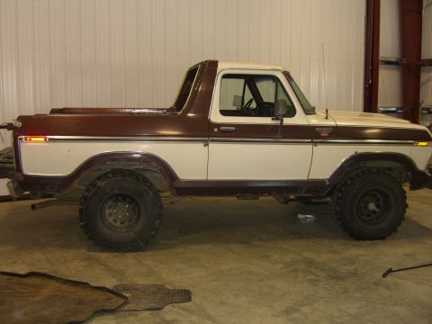 1979 Ford Bronco - This 1978 Ford Bronco is shown from the side in a garage setting.