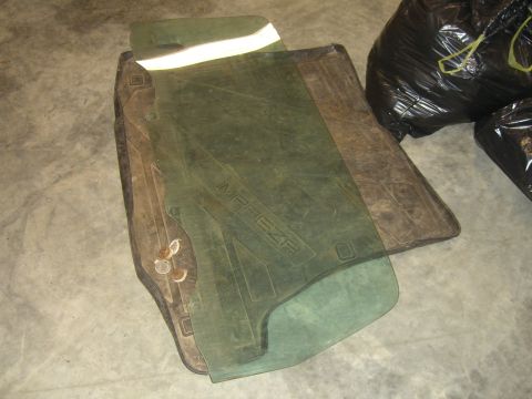 1979 Ford Bronco - Car window and floor mats are shown, with the word "MAREZZA" visible on one of the mats.