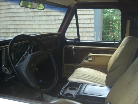 1979 Ford Bronco - Interior view of a 1979 Ford Bronco, showing the dashboard, steering wheel, and seating.