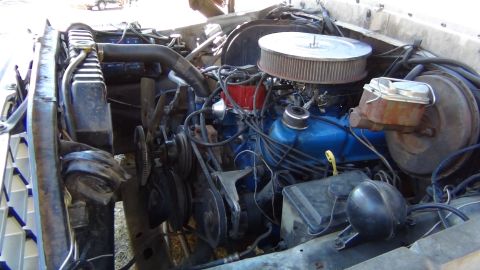 1979 Ford Bronco - Engine bay of a 1979 Ford Bronco, showing the V8 engine and associated components.