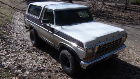 1979 Ford Bronco - This 1978 Ford Bronco is seen from a 3/4 front angle on a dirt road.