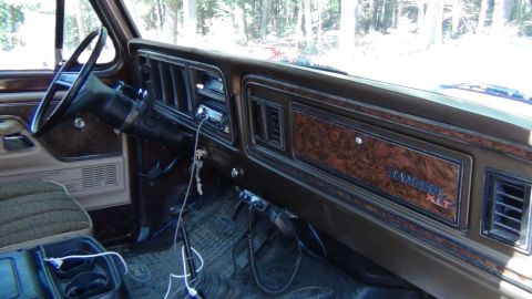 1979 Ford Bronco - The dashboard of a 1979 Ford Bronco features wood grain accents and the 'Ranger XLT' trim designation.