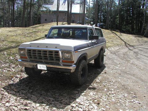 1979 Ford Bronco - This 1979 Ford Bronco is captured in a three-quarter front view, its distinctive two-tone paint scheme.