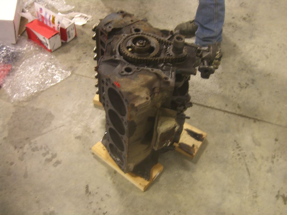 Engine block on wooden pallets