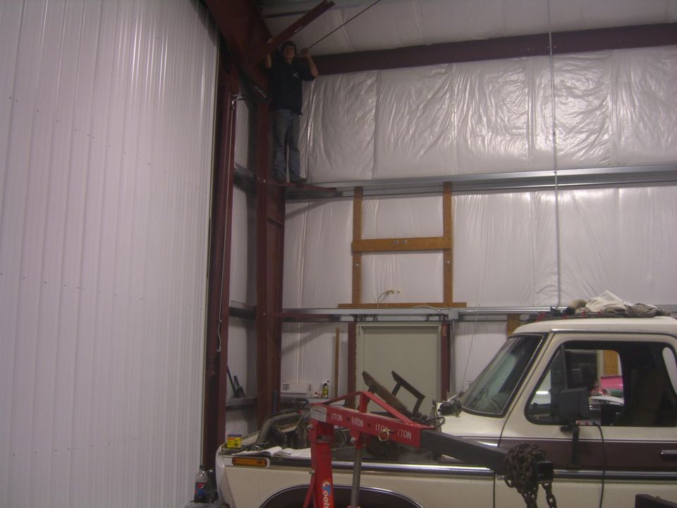 1979 Ford Bronco, tan and brown, 3q-front view in garage