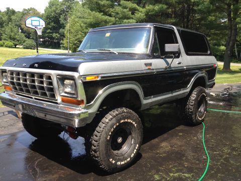 1979 Ford Bronco - This lifted Ford Bronco sits on a wet driveway, ready for its next adventure.