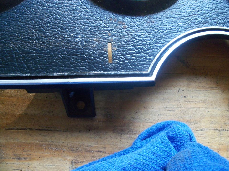 This pic shows the difference between the old paint, upper trim line, and the newly applied finish to the lower trim line.