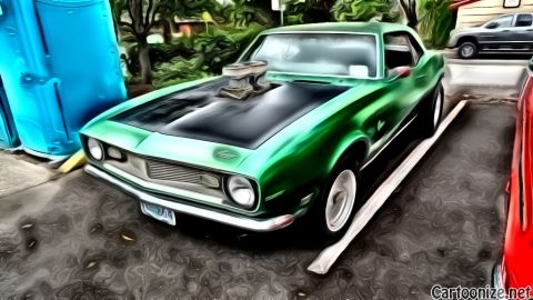 1964 Ford Fairlane - This green 1969 Camaro features a prominent hood scoop and a contrasting black hood.