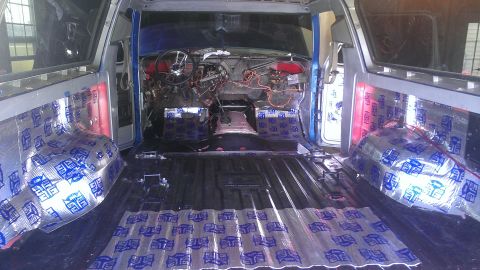 1978 Ford Bronco - Vehicle interior being prepped for soundproofing, showing exposed wiring and bare metal.