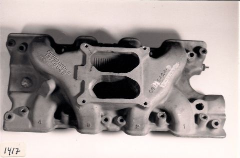 1973 Ford Mustang - Close-up of an engine intake manifold, showing casting marks and part numbers.