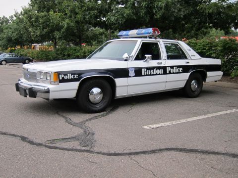 1991 Ford LTD Crown Victoria - This 1991 Ford Crown Victoria LTD police car is marked "Boston Police" and features a light bar on the roof.