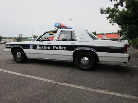 1991 Ford LTD Crown Victoria - This 1991 Ford Crown Victoria police car features the distinctive "Boston Police" livery and a light bar on the roof.