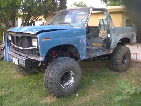 1990 Ford Bronco - This heavily modified Ford Bronco appears to be from the late 1970s, not a 1990 model.