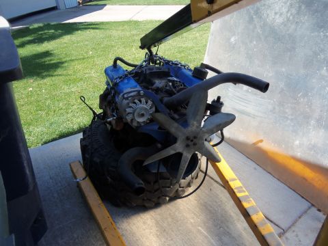 1968 Ford Bronco - Ford V8 engine being prepared for installation or transport.