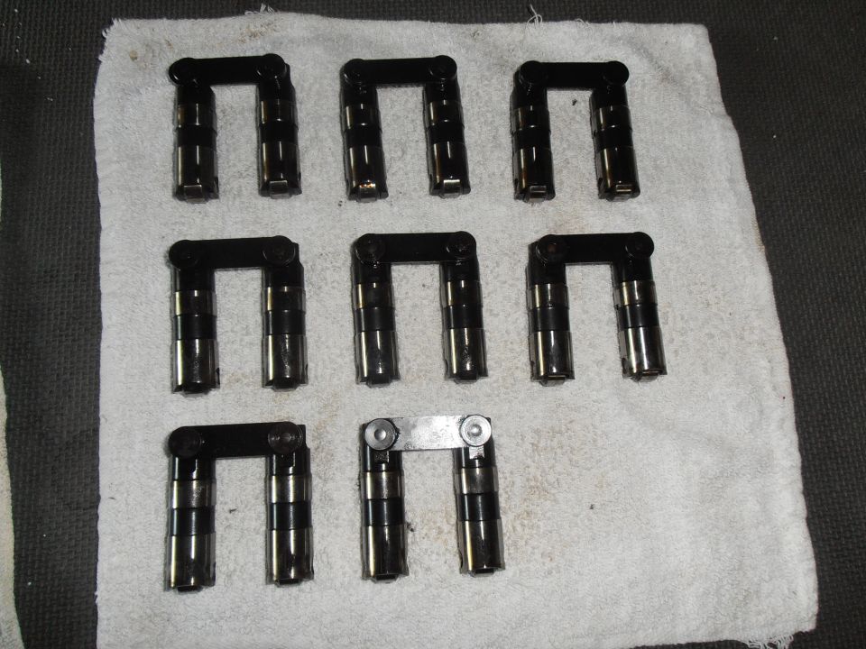 Set of engine lifters on a white towel