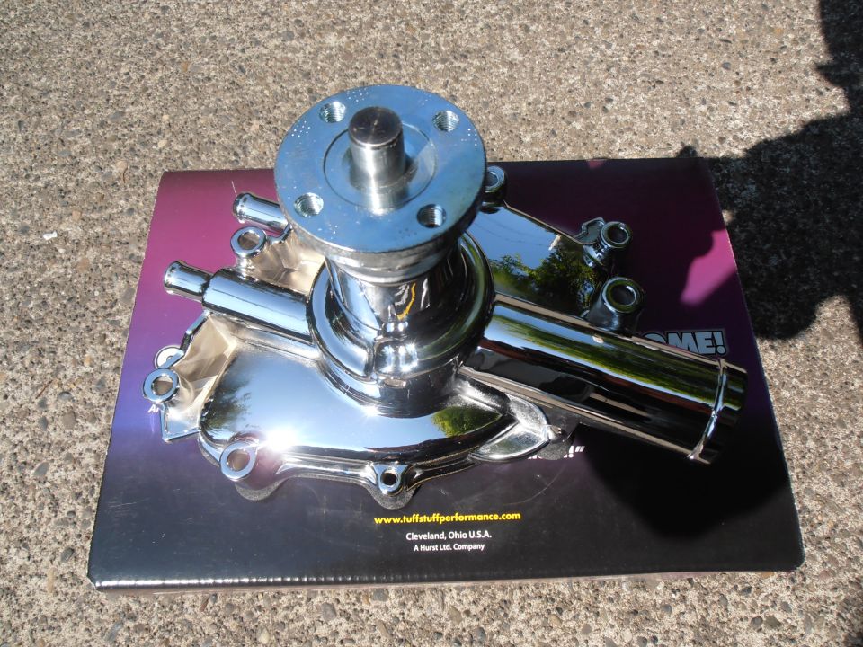 chrome water pump on a box with website www.tuffstuffperformance.com