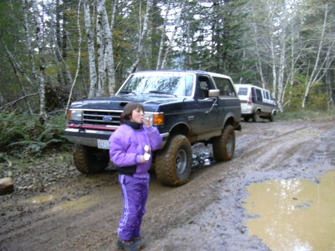 1991 Ford Bronco - The Mud Monster standing in front of my Bronco