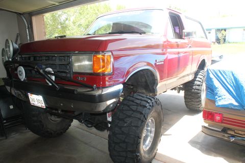 1990 Ford Bronco - This lifted 1990 Ford Bronco is ready for off-road adventures with its aggressive tires and auxiliary lighting.