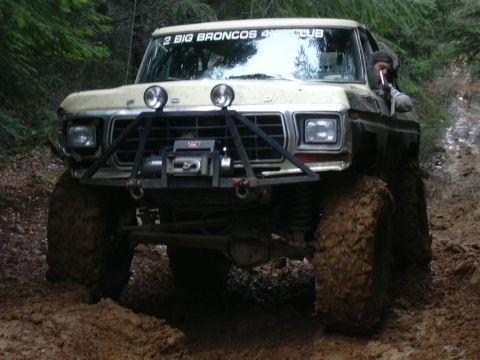 1991 Ford Bronco - This heavily modified 1978 Ford Bronco navigates a muddy off-road trail.