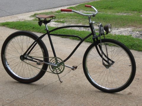 1994 Ford Bronco - A custom cruiser bicycle with a vintage aesthetic is parked on a concrete surface.