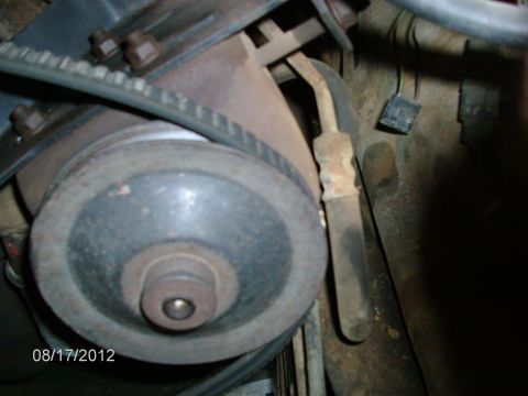 1979 Ford F-150 - This image shows a close-up view of a vehicle's engine components, specifically a pulley and belt. The date 08/17/2012 is visible.