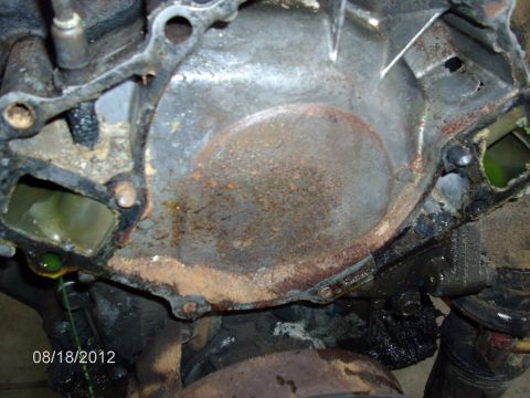 1979 Ford F-150 - Close-up view of an engine block showing signs of corrosion and a coolant leak, timestamped August 18, 2012.