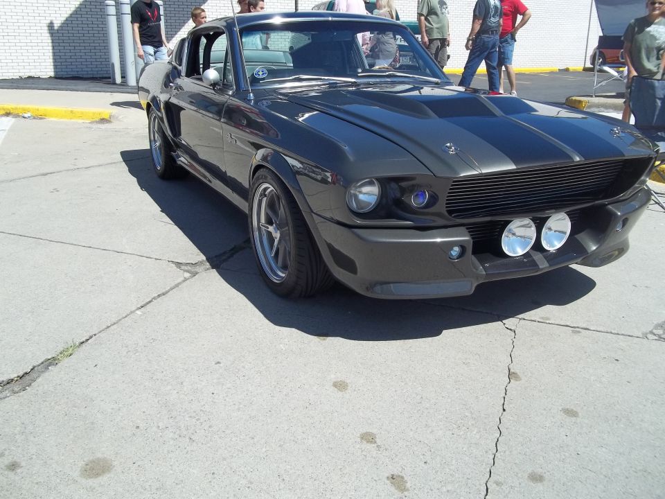 1967 Shelby GT500 Mustang with racing stripes and fog lights