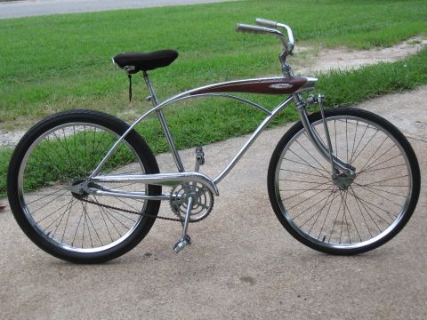 1994 Ford Bronco - A side view of a custom cruiser bicycle with chrome frame and black tires.