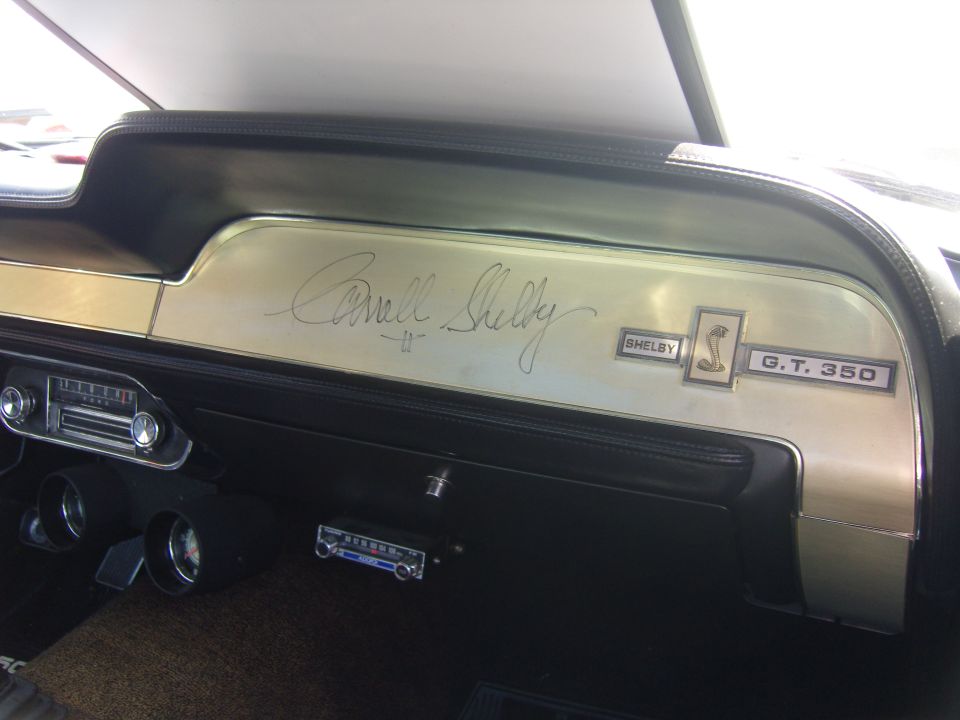 Dashboard trim with Carroll Shelby signature, Shelby Cobra logo, and G.T. 350 badge
