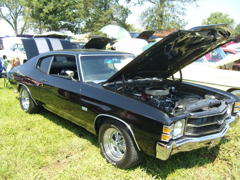 Black 1970 Chevrolet Chevelle SS coupe, hood open, showing engine