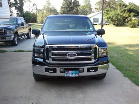 2001 Ford Excursion - This 2001 Ford Excursion is shown from the front, its prominent chrome grille and headlights.