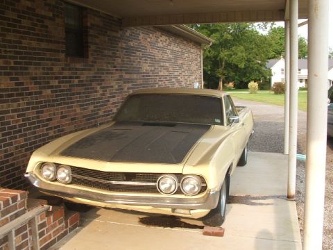1972 Ford Ranchero - This 1970 Ford Ranchero, identified by its grille and body style, is parked under a carport.